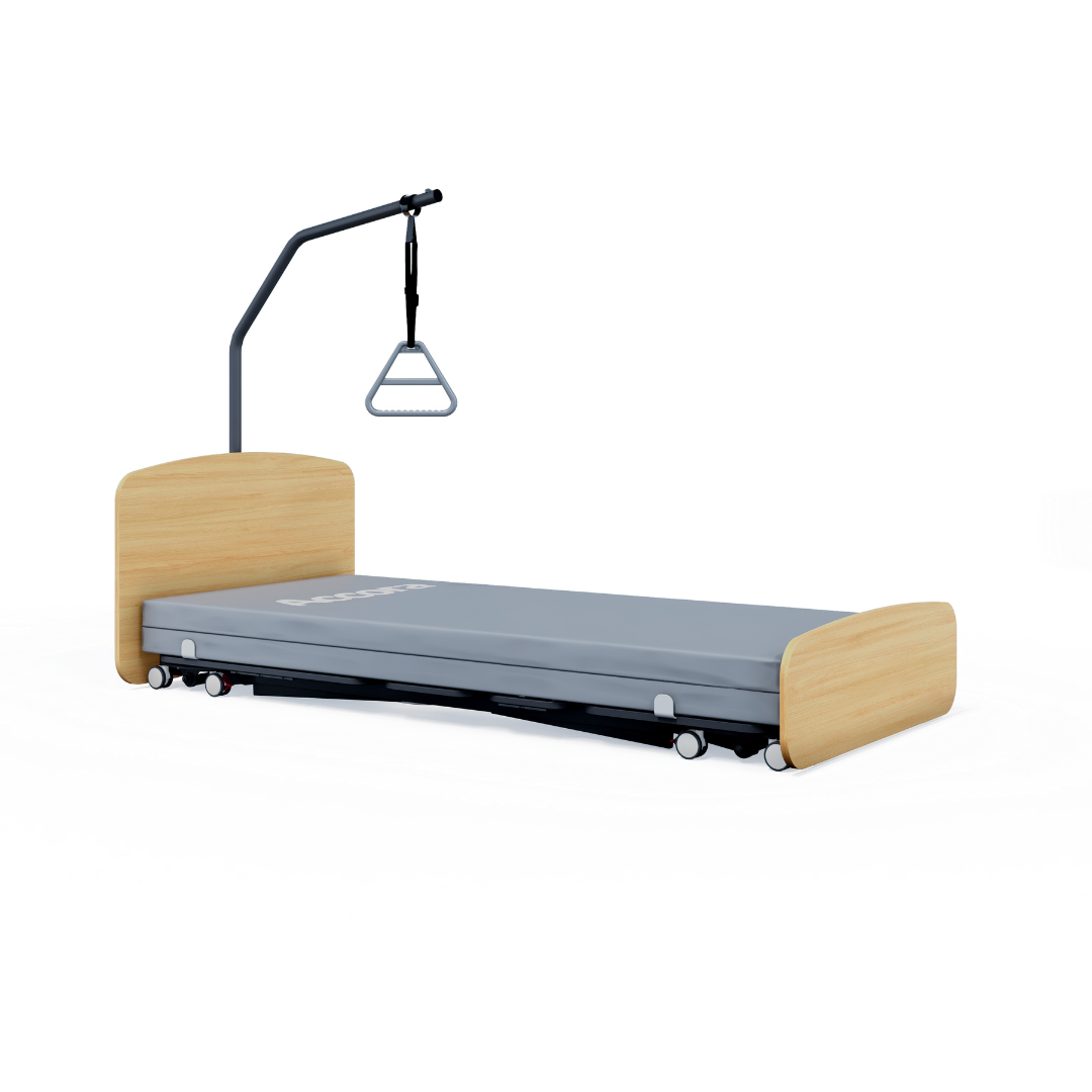 The Accora Contesa® FloorBed® Hi/Low Full Electric Bed features a wooden headboard/footboard, gray mattress, wheels, and an overhead trapeze bar with triangular handle for smart patient support and fall prevention.