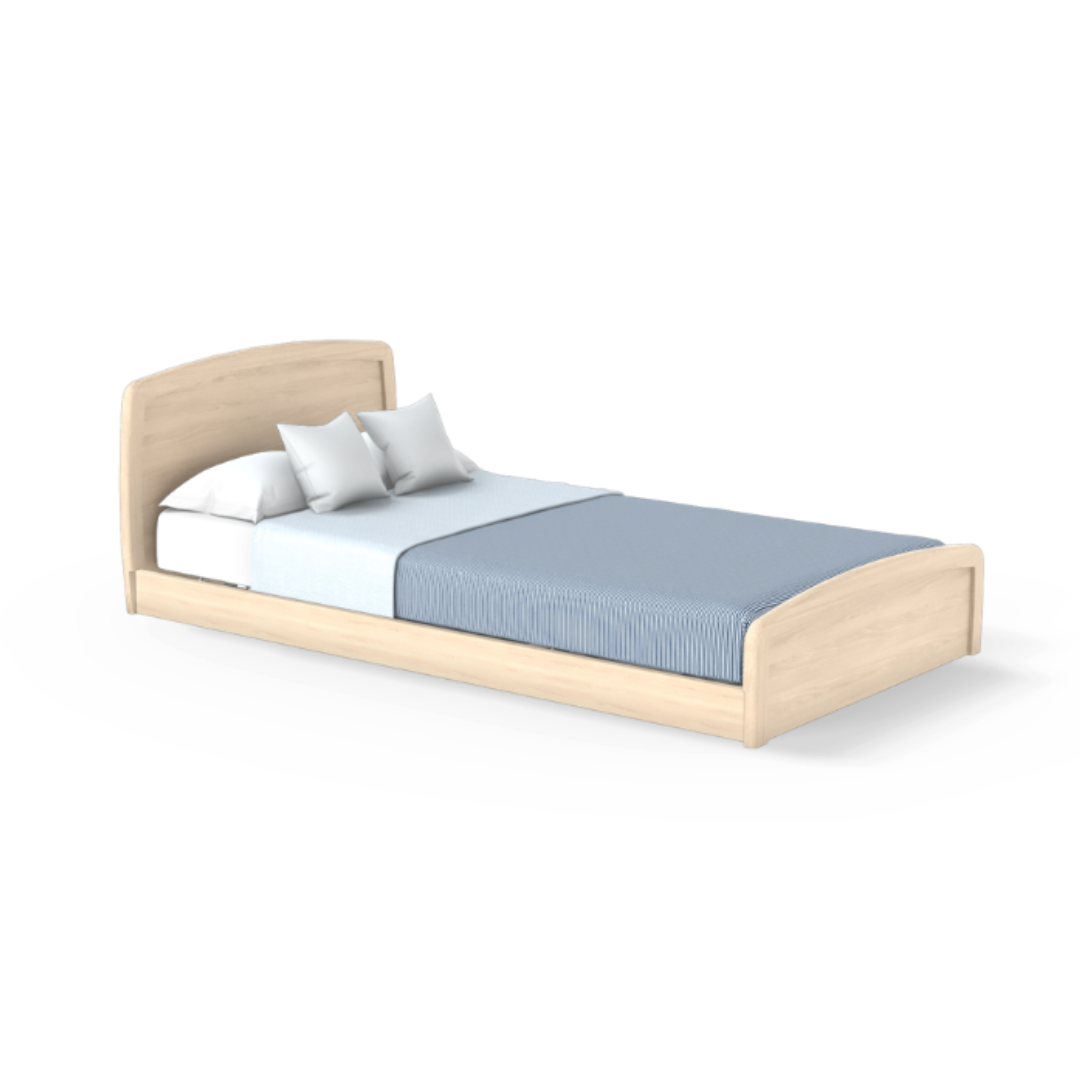The Accora Empresa® Full Electric Bariatric FloorBed® features a light wood design with a curved headboard and footboard, styled with blue bedding and white pillows for a modern look ideal for minimalist or CSS-inspired interiors.