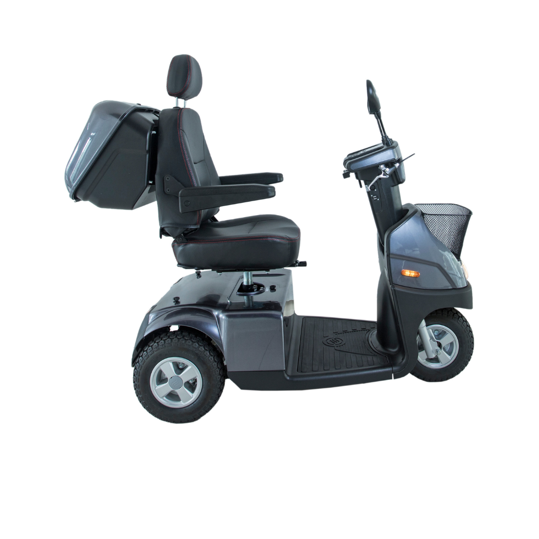 Side view of the Afikim Afiscooter C3 HD, a sleek black and gray mid-size 3-wheel mobility scooter, featuring a padded seat with armrests and headrest, storage compartment behind the seat, and a front basket.