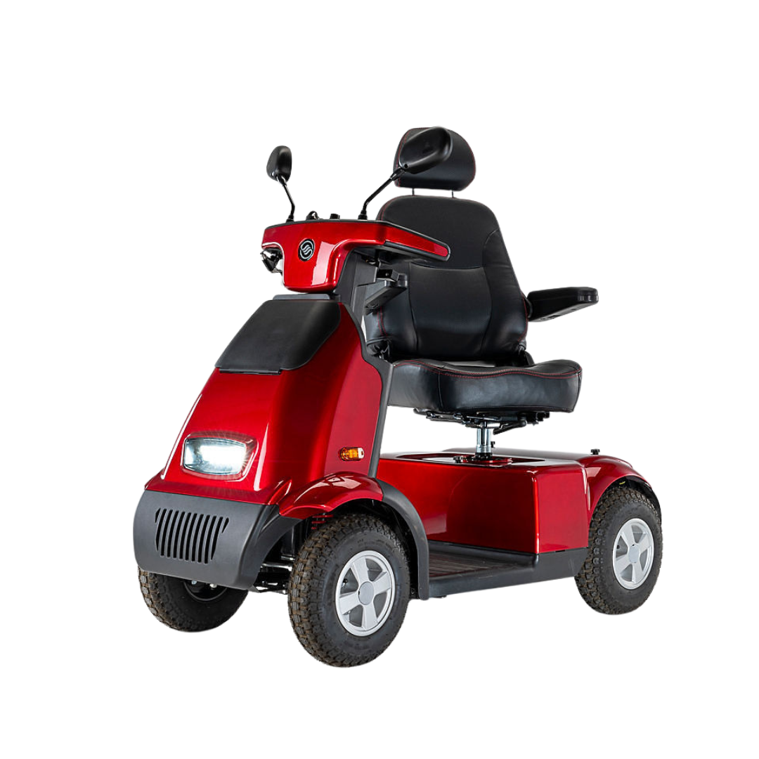 The Afikim Afiscooter C4 HD Mobility Scooter in red includes a black orthopedic seat with backrest and armrests. It features four wheels, a steering handle, headlight, and mirrors, offering a modern and sturdy design.