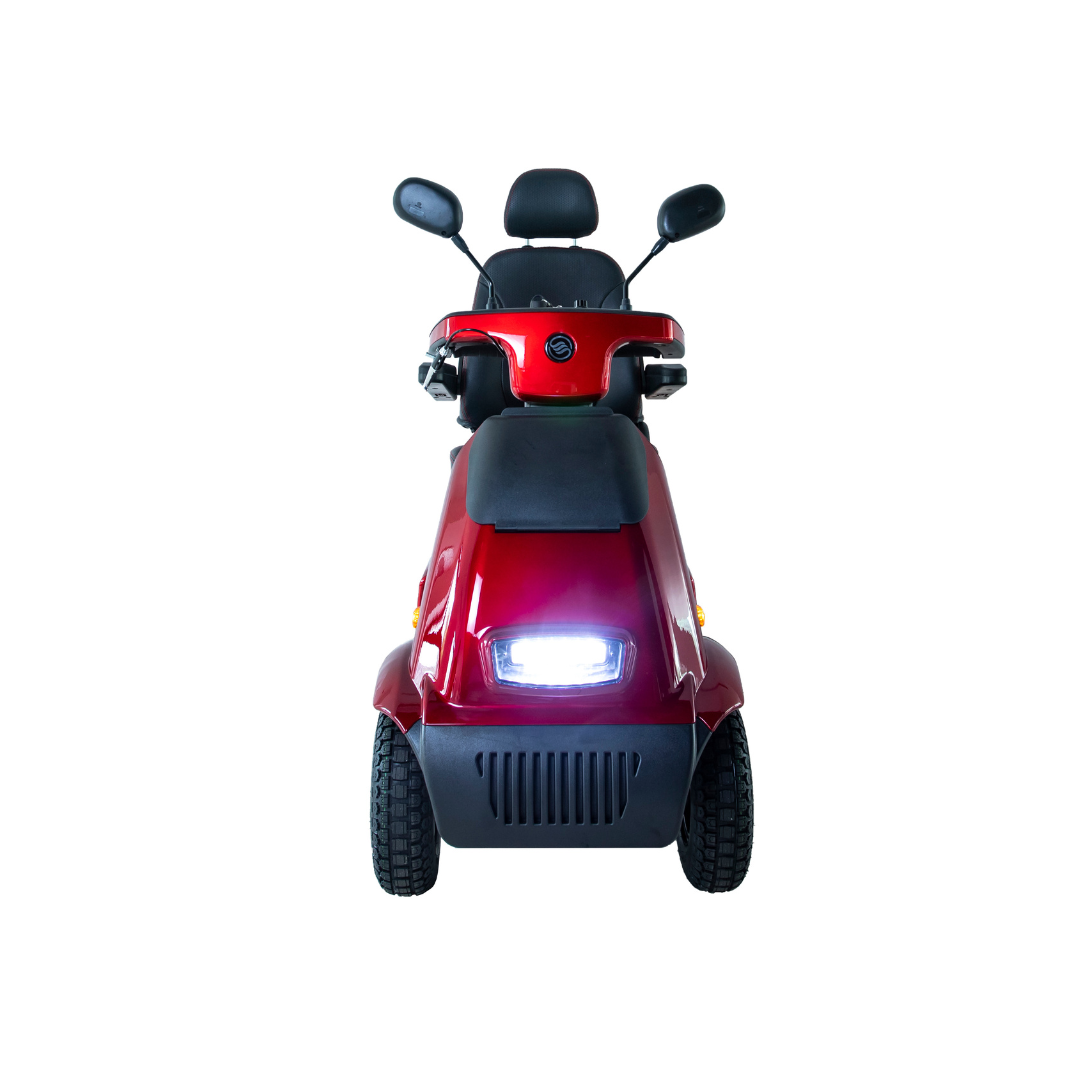 Front view of the Afikim Afiscooter C4 HD in red, a 4-wheel electric mobility scooter on a white background. It includes two mirrors, handlebars, an orthopedic cushioned seat, and visible front lights.