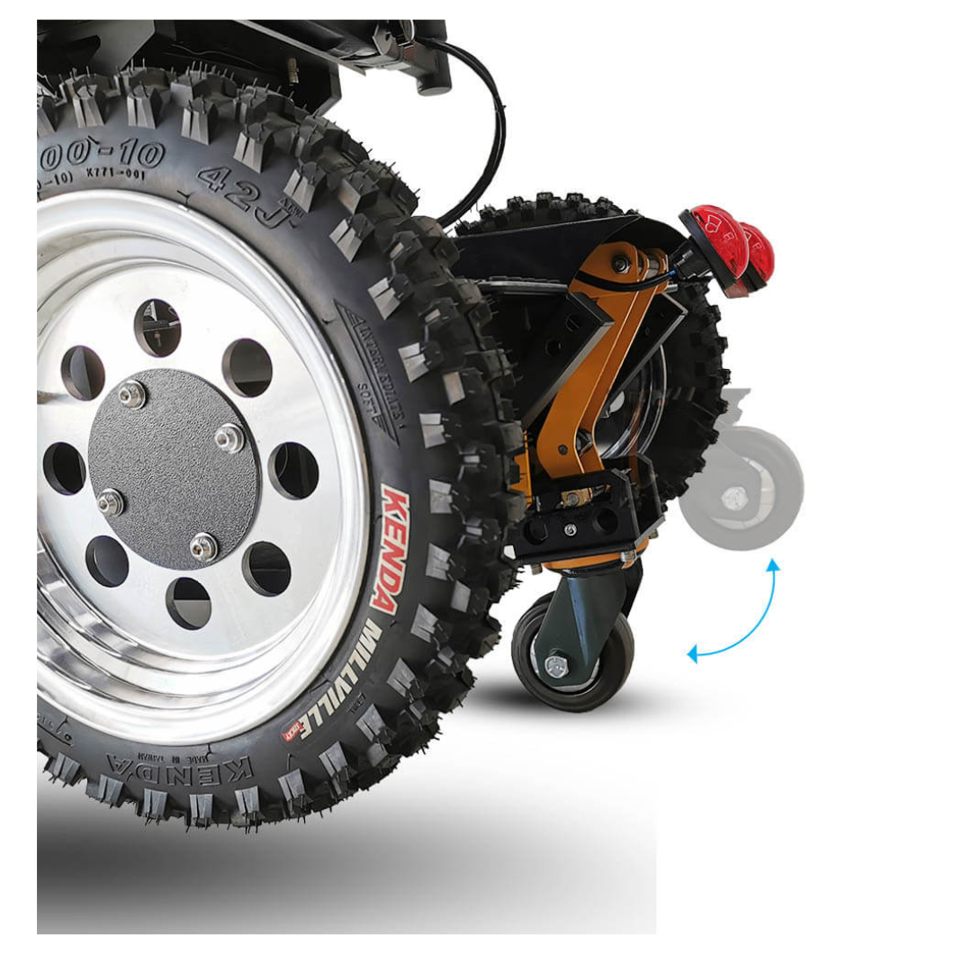 Close-up of a Wheelchair88 All-Terrain Stair Climbing 4x4 Recreational Electric Vehicle wheel featuring off-road KENDA Millville treads and a small caster with a blue arrow highlighting its swiveling motion.