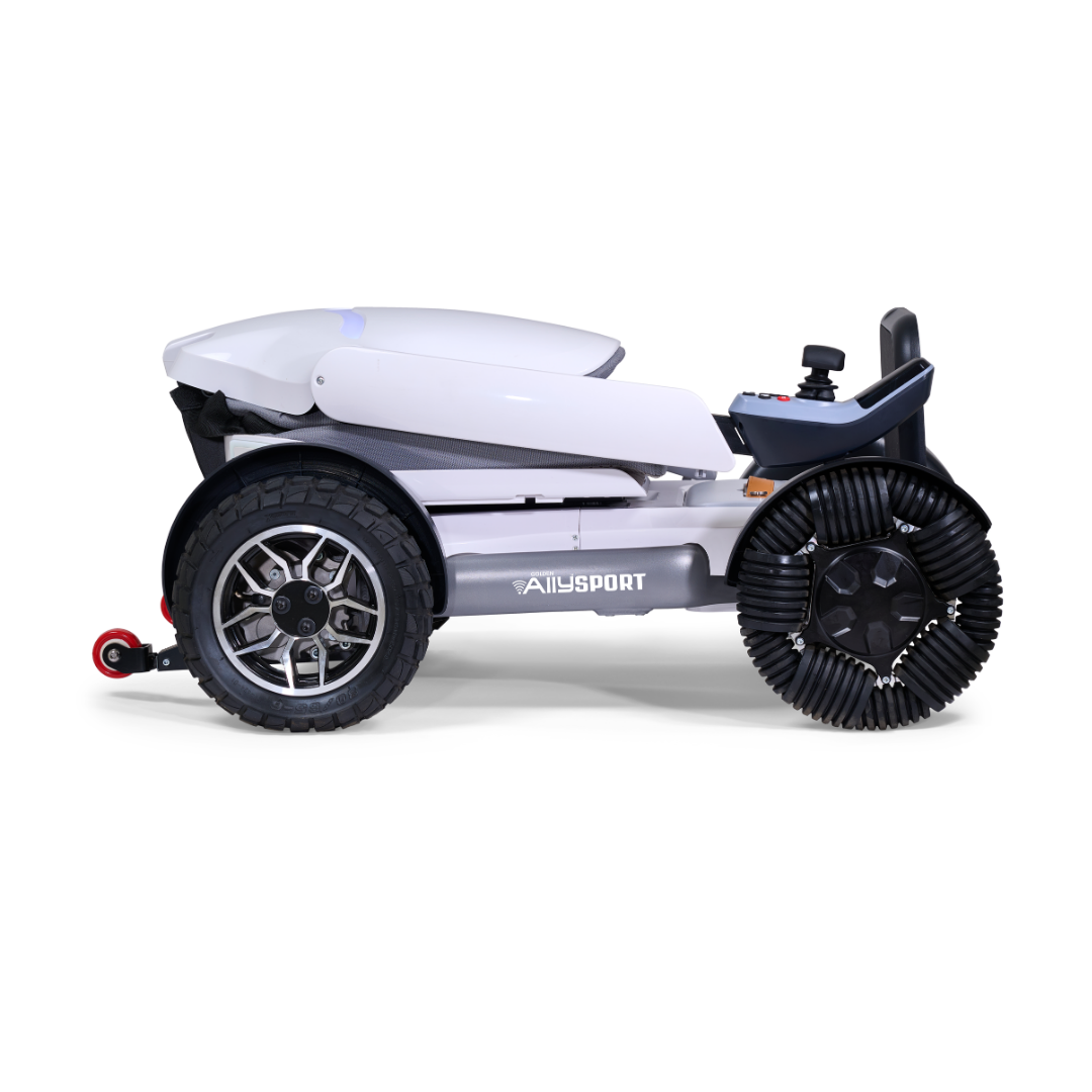The Golden Tech Ally Sport Smart Powerchair features omni-directional wheels, app control, padded seat, armrests, and joystick. Shown folded in a side view against a white background.
