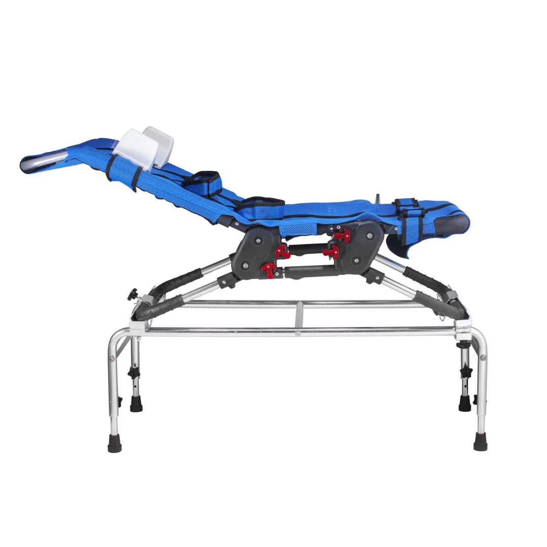 The Circle Specialty Pediatric Anchor Bath Chair features a blue adjustable seat with straps, padded support, and a reclining backrest on a silver frame with black feet—ideal for securely positioning children during bathing.