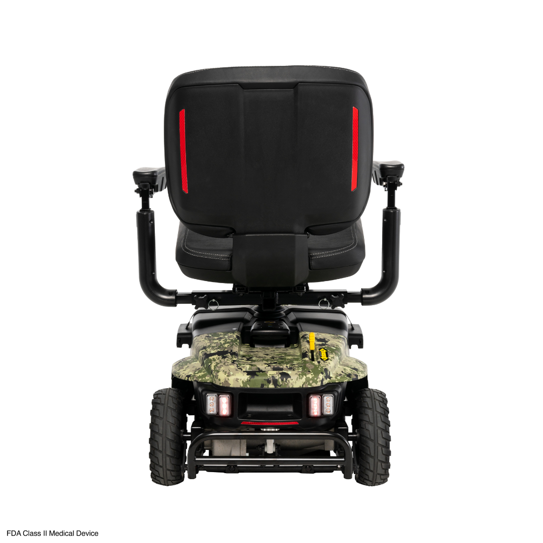 The Pride Baja® Bandit 4 Wheel Scooter has a camo-patterned base, black seat, and features two red vertical lights on the backrest. It boasts chunky all-terrain wheels and is powered by a reliable lithium-ion battery, making it ideal for off-road excursions in diverse environments.