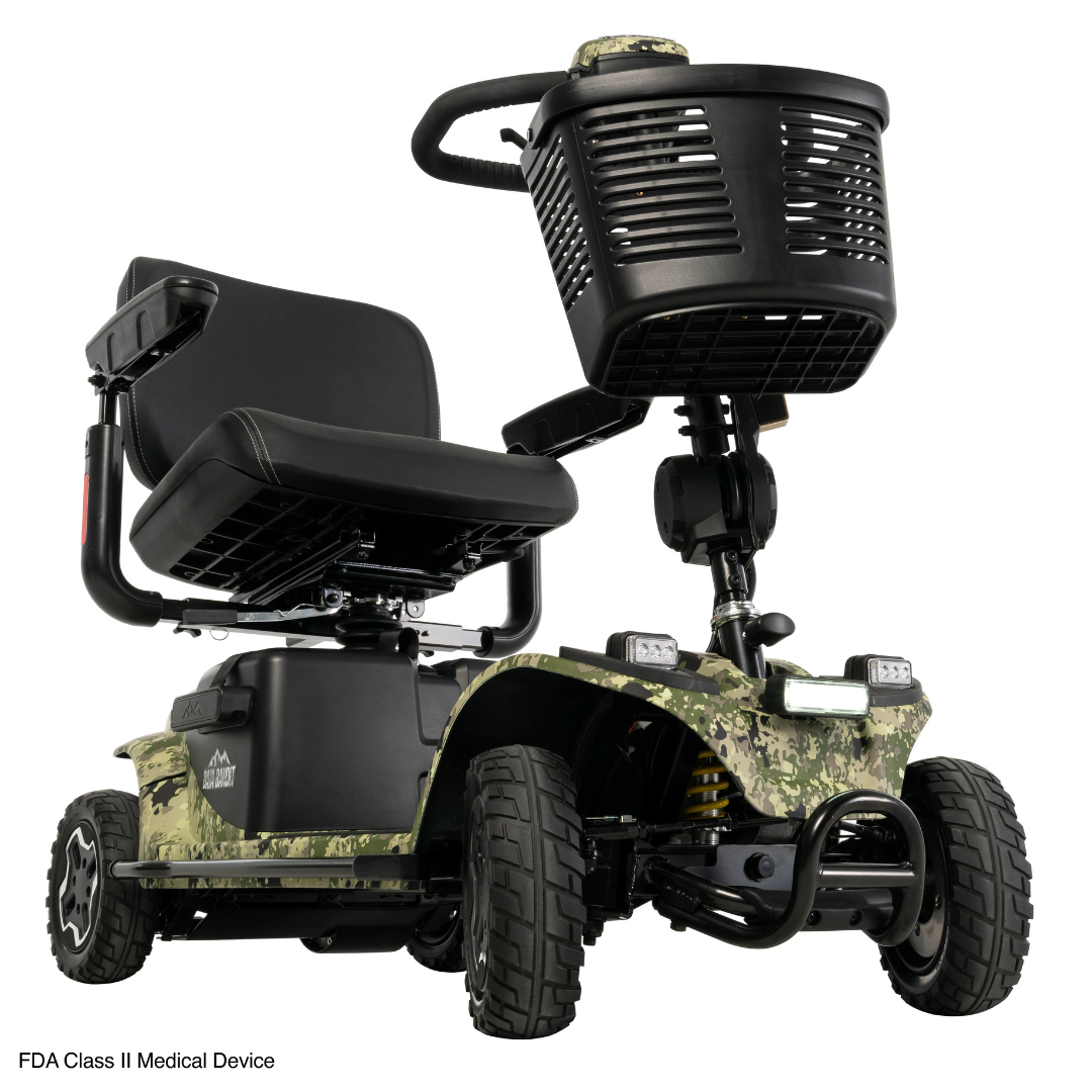 The Pride Baja® Bandit 4 Wheel Scooter sports a rugged camouflage design with thick tires and full suspension for off-road use. It features a black seat, front basket, elevated front end, and a lithium-ion battery for optimal outdoor adventures.