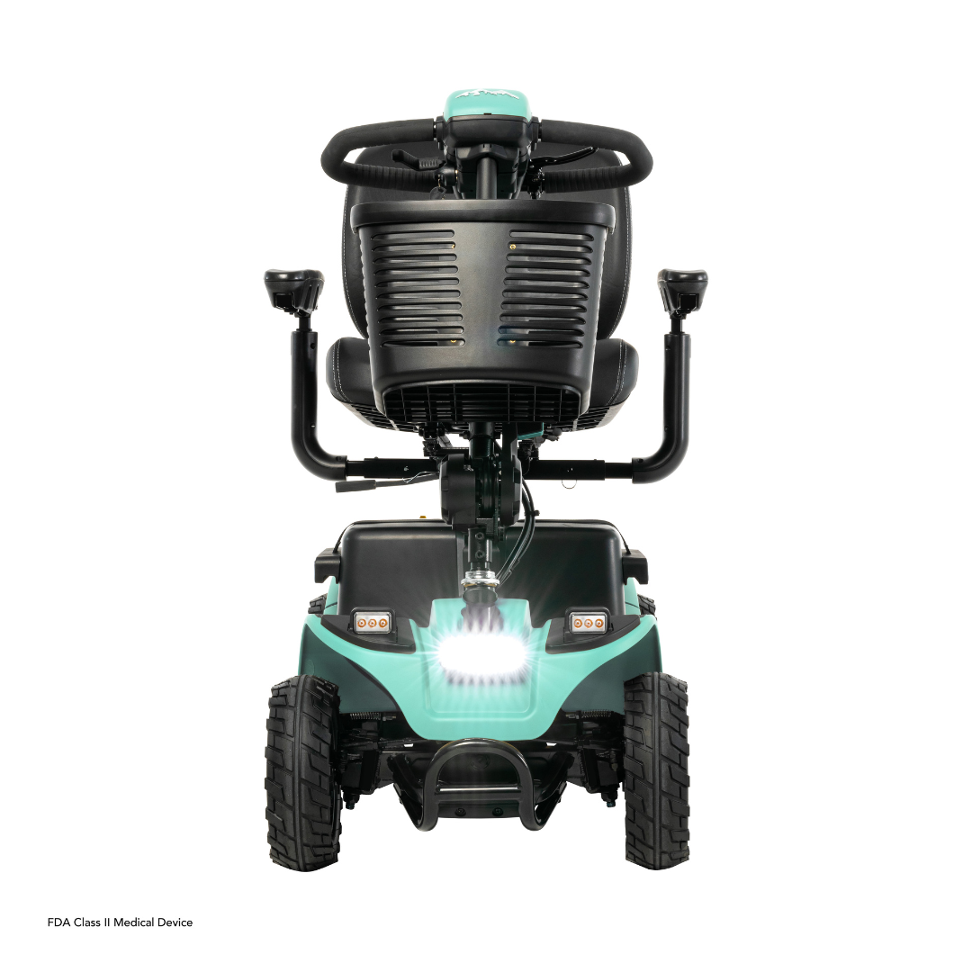 Front view of the Pride Baja® Bandit 4 Wheel Scooter in teal featuring a black seat, handlebars, and sturdy wheels. Its equipped with full suspension, a bright headlight, runs on dual lithium-ion batteries, and is classified as an FDA Class I Medical Device.