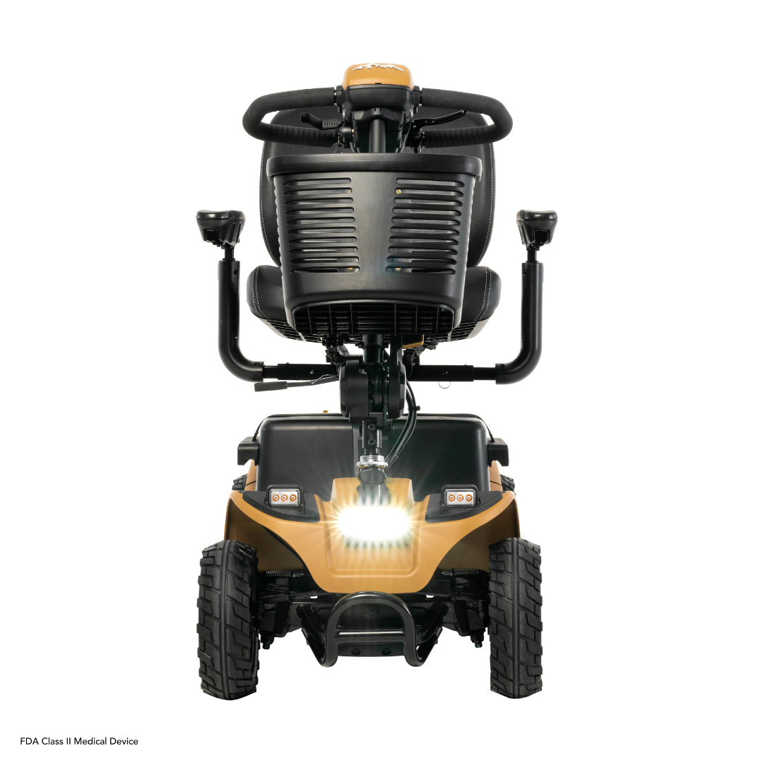The Pride Baja® Bandit 4 Wheel Scooter, shown front-on against a plain white background, features four large treads, handlebars, and a seat. It has a bright headlight, full suspension for stability in outdoor adventures, and dual lithium-ion batteries for extended use.
