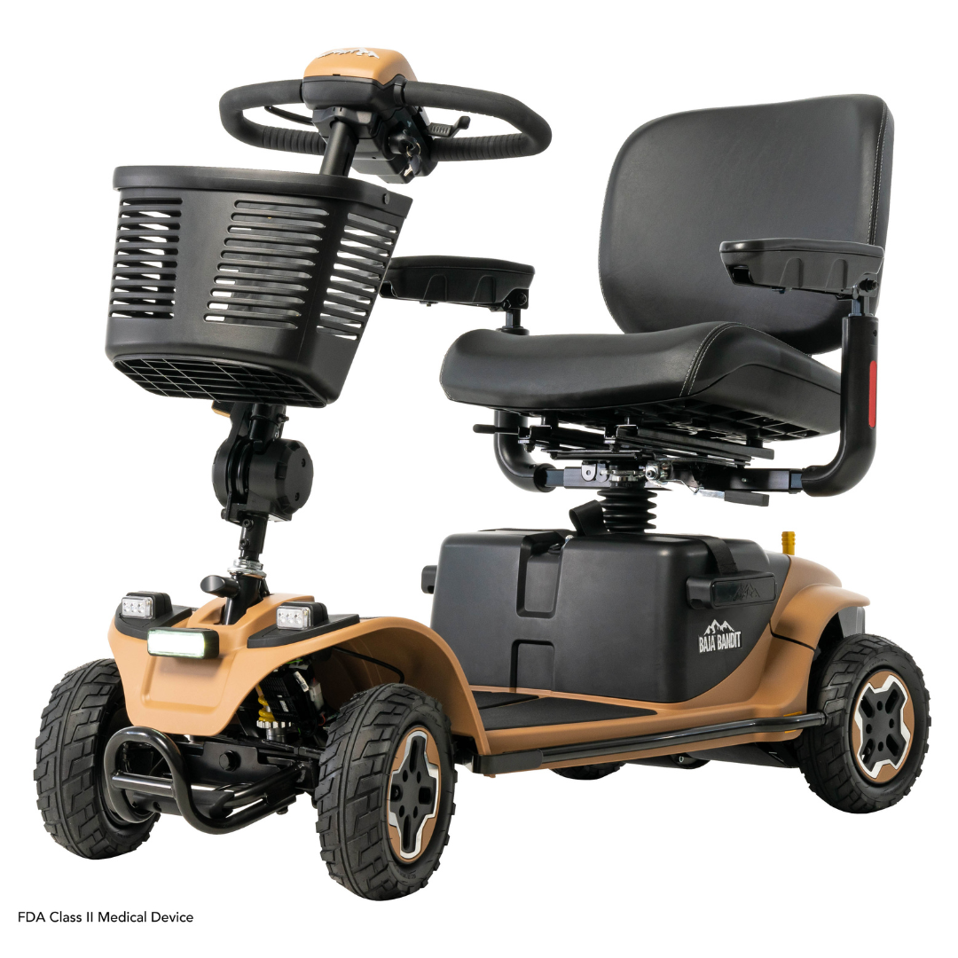The Pride Baja® Bandit 4 Wheel Scooter, in tan and black, features a robust design with four wheels, full suspension, and dual lithium-ion batteries. It comes with a front storage basket, padded seat, armrests, and handlebar control panel—ideal for enhancing mobility on diverse terrains.