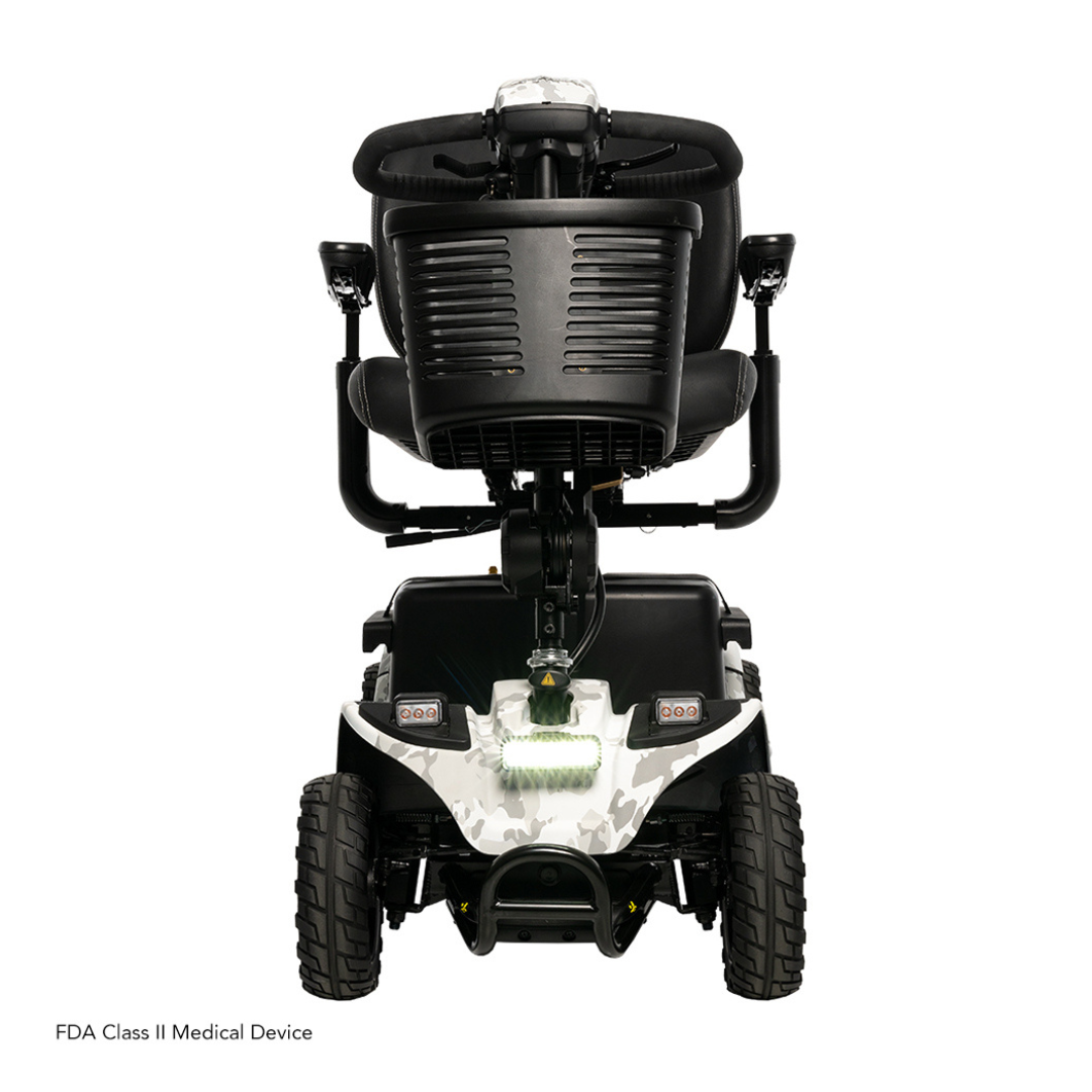 The rear view of the black Pride Baja® Bandit 4 Wheel Scooter showcases its strong wheels, camo-patterned base, cushioned seat with armrests, and handle for back support. It features full suspension and two rear lights, classified as an FDA Class II Medical Device.