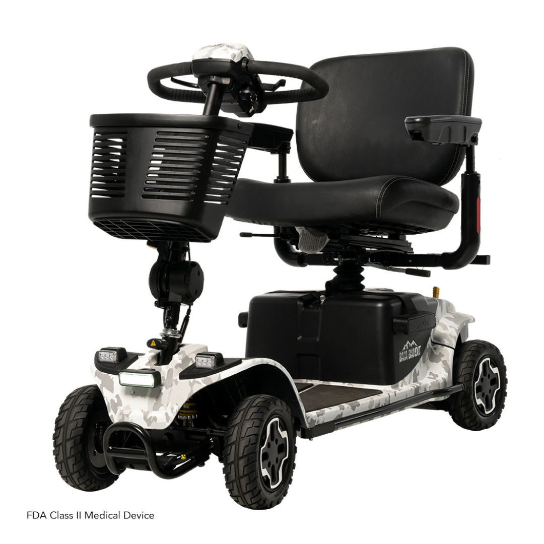 The Pride Baja® Bandit 4 Wheel Scooter features a camouflage base, black seat and armrests, front storage basket, full suspension for off-road comfort, four wheels, and dual lithium-ion batteries for extended power.
