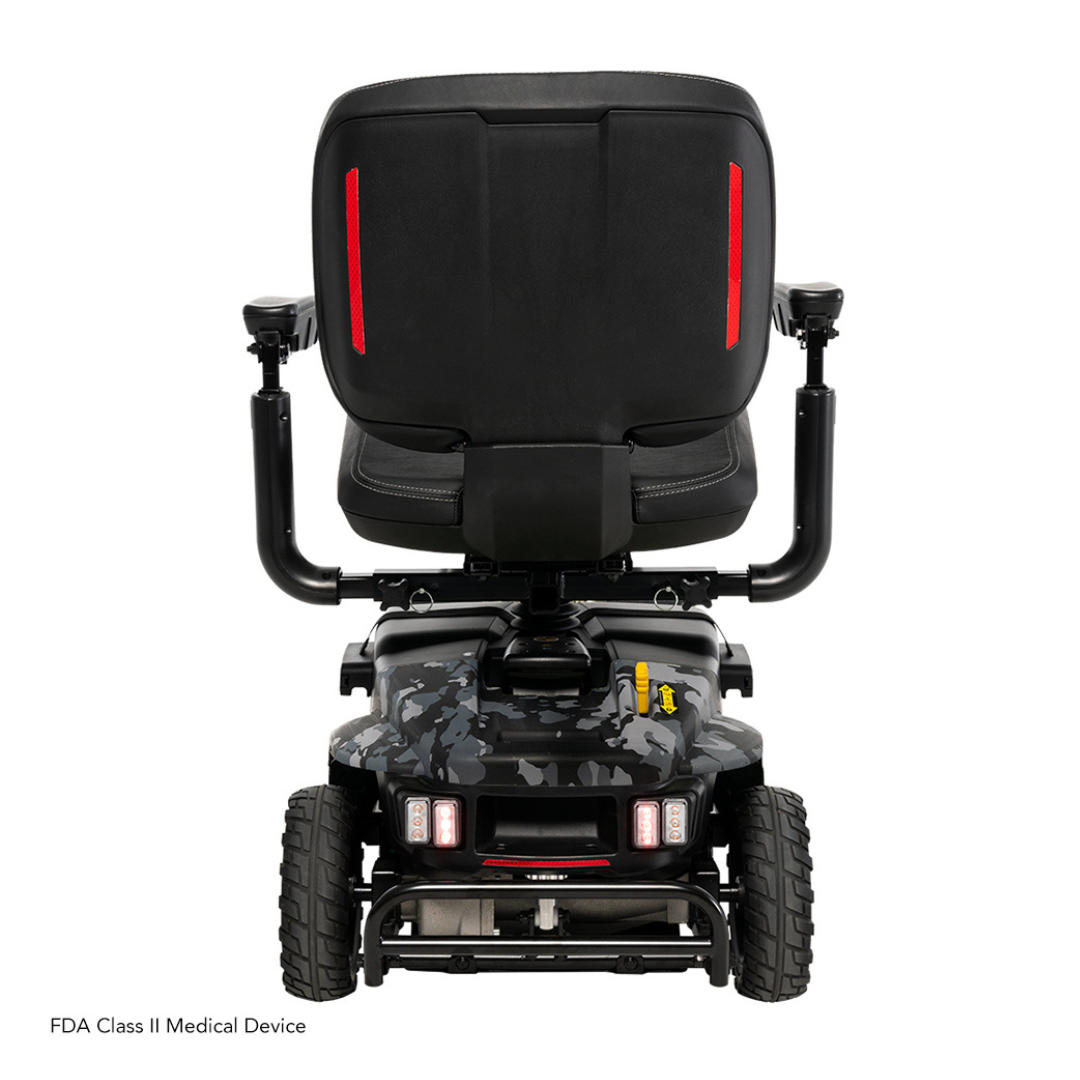 The Pride Baja® Bandit 4 Wheel Scooter showcases a black design with textured base, red accents on the backrest, and full suspension for off-road use. It has sturdy wheels and is an FDA Class II Medical Device featuring a reliable lithium-ion battery.