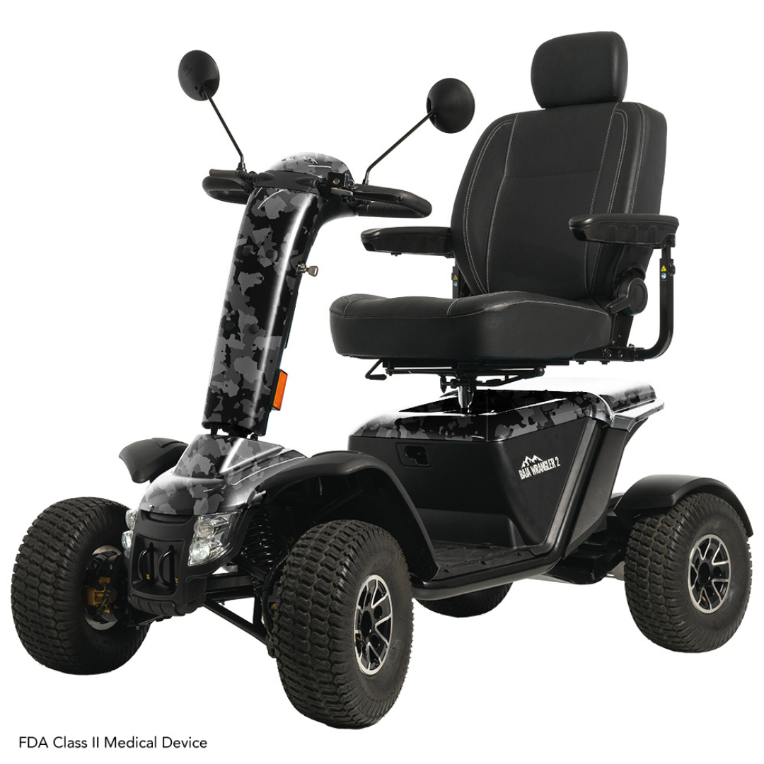 The Pride Baja® Wrangler® 2, a heavy-duty outdoor scooter, comes in black with four wheels. It features a comfortable padded seat, armrests, high back, and rearview mirrors. Camouflage-patterned handlebars ensure durability and performance. This FDA Class II medical device is ideal for rugged terrain.