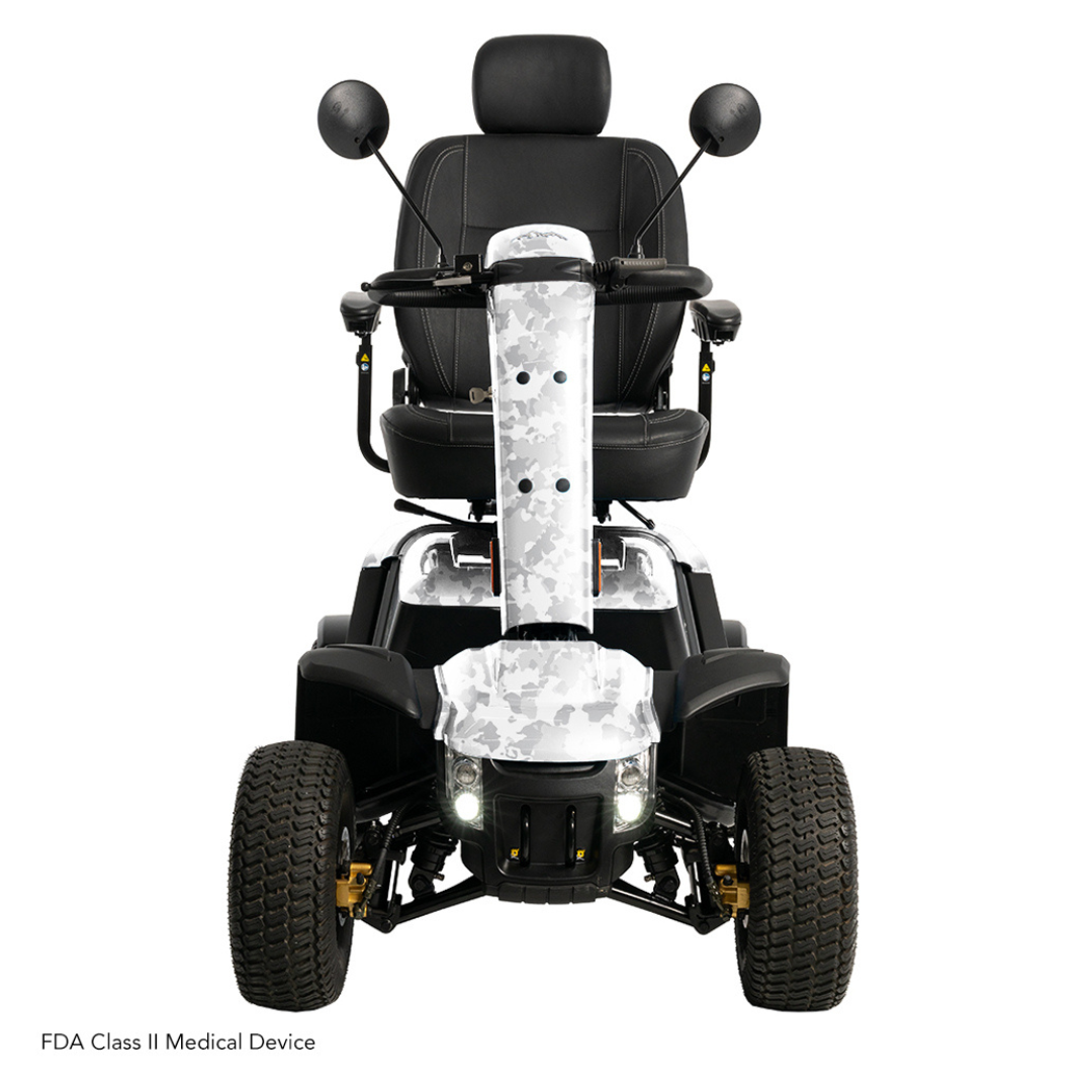 The Pride Baja® Wrangler® 2 Heavy Duty Outdoor Scooter, an FDA Class II Medical Device, features large textured tires, a padded seat with armrests, mirrors, headlights for night safety, and CTS Suspension for a smooth ride on all terrains.