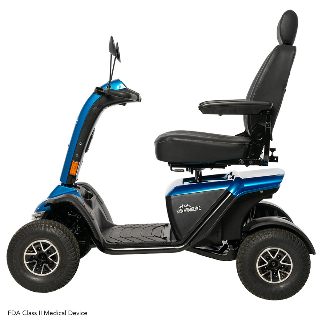 The Pride Baja® Wrangler® 2 Heavy Duty Outdoor Scooter features a sturdy four-wheel design, high backseat, armrests, and large wheels. With its rugged terrain capability and blue with black accents, its perfect for outdoor use.