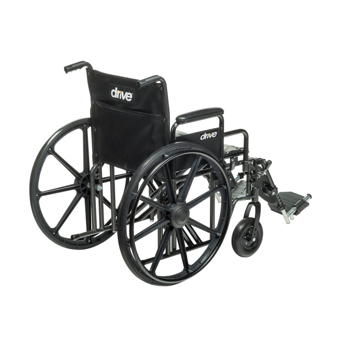 The Drive Bariatric Sentra EC Heavy-Duty Wheelchair is black, shown from a rear-side angle, with large rear wheels, footrests, and "drive" branding. It features a 450 lb weight capacity.
