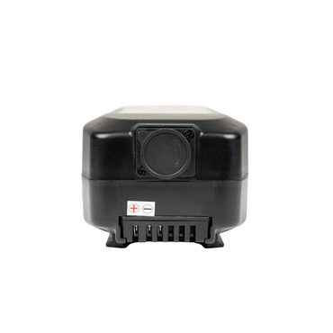 The Battery for Forcemech Carbon F1 Power Chair is a compact black rectangular battery with a circular port, metal connectors, and polarity markings—an ideal lightweight power source for portable convenience.