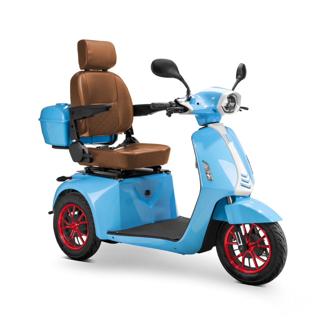 The Bespoke Elite Recreational 3-Wheel Scooter with Electric Brake Assist is light blue with red-rimmed wheels, a high brown cushioned seat, backrest, armrests, side mirrors, headlight, rear storage box, and a digital speedometer—great for tall riders.