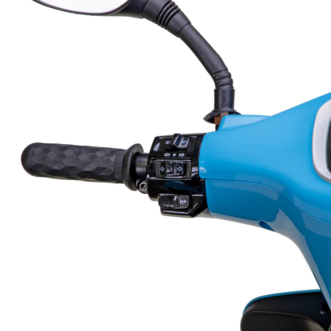 Close-up of the left handlebar of the Bespoke Elite Recreational 3-Wheel Scooter with Electric Brake Assist, showing the black rubber grip, control switches, rearview mirror stem, and digital speedometer against a white background.