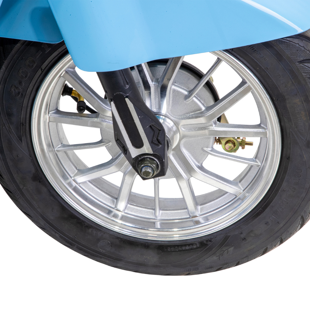Close-up of a silver alloy wheel with black tire on the Bespoke Elite Recreational 3-Wheel Scooter with Electric Brake Assist—detailed spokes and blue fender, perfect for tall riders seeking comfort and style.
