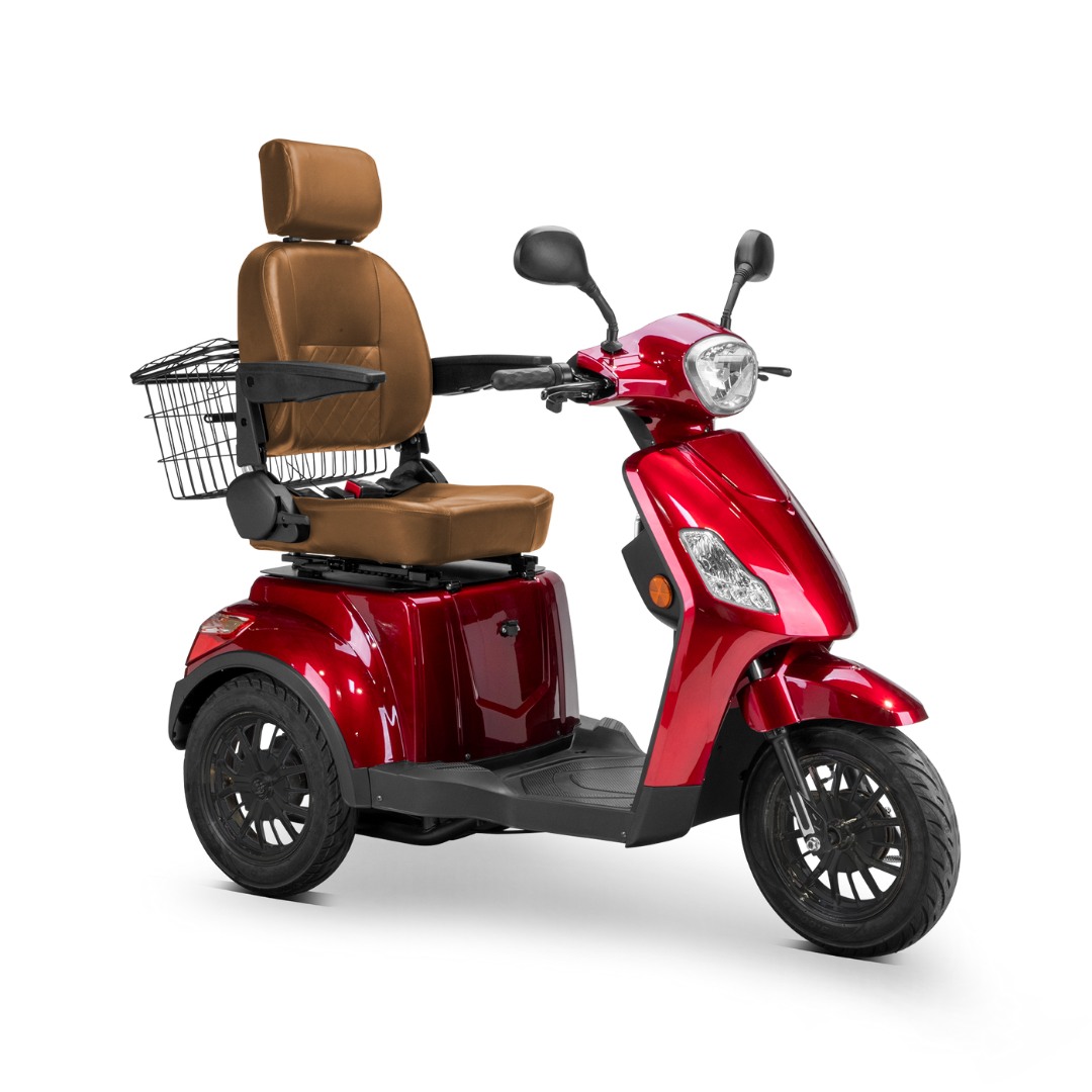 The Bespoke Legacy Recreational 3-Wheel Scooter in shiny red features a 600-watt motor, tan cushioned seat with headrest and armrests, black wire rear basket, and is displayed on a white background.