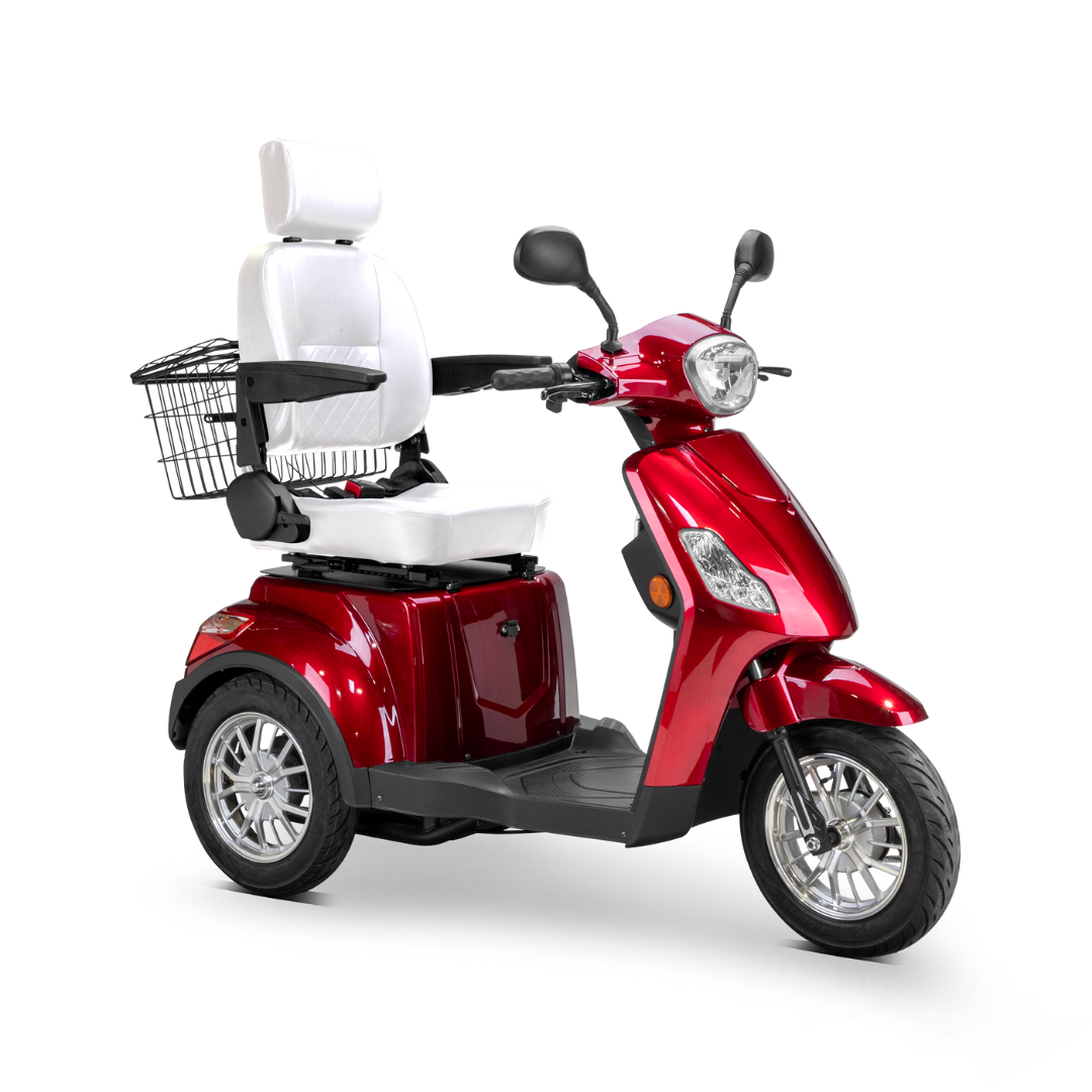 The Bespoke Legacy Recreational 3-Wheel Scooter is red with a white cushioned seat, headrest, backrest, black armrests, front headlight, rear wire basket, and features a powerful 600-watt motor for smooth mobility.