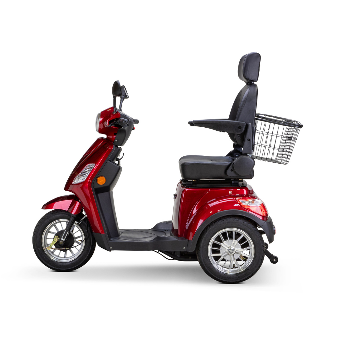 A Bespoke Legacy Recreational 3-Wheel Scooter in red, featuring a 600-watt motor, black cushioned seat with headrest and armrests, and a rear metal basket is shown in profile on a white background.