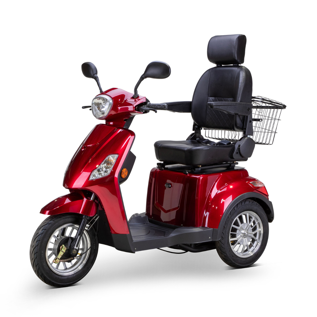 The Bespoke Legacy Recreational 3-Wheel Scooter, shown in red with a black cushioned seat, armrests, backrest, rear basket, and side mirrors on a white background, features a 600W motor for speeds up to 15 mph.