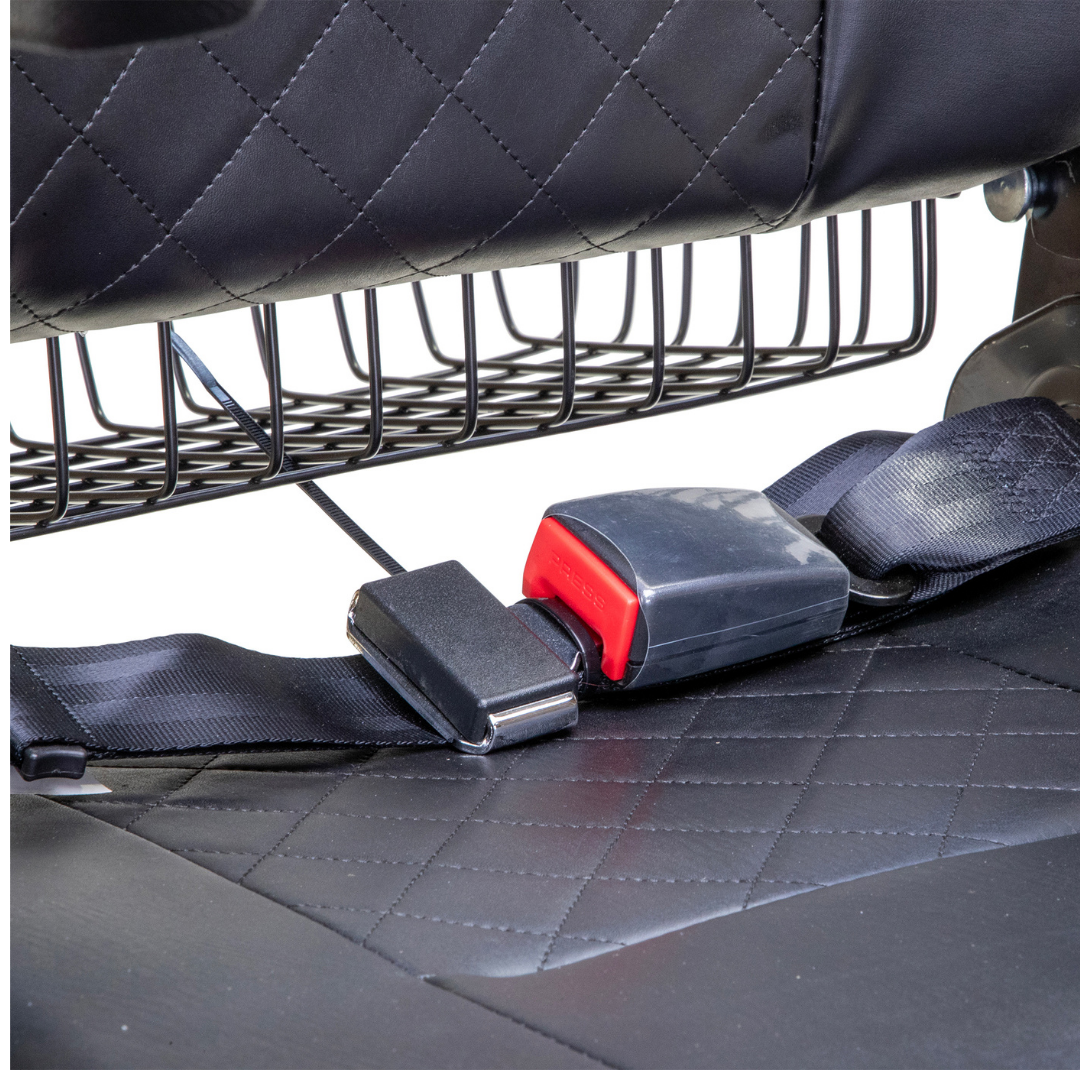 Close-up of a black car seat with diamond stitching, a fastened seat belt buckle, and a wire storage rack—perfect for storing your Bespoke Legacy Recreational 3-Wheel Scooter with its robust 600W motor and top speed of 15 mph.