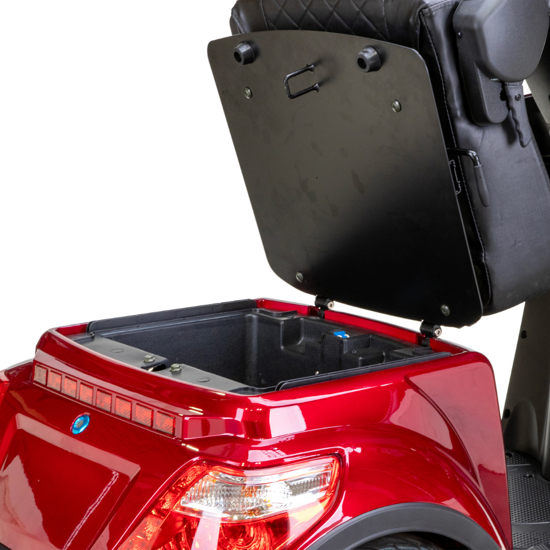 A close-up of the Bespoke Legacy Recreational 3-Wheel Scooter highlights its red frame and spacious under-seat storage, revealed with the seat lifted, along with features like a powerful 600-watt motor.