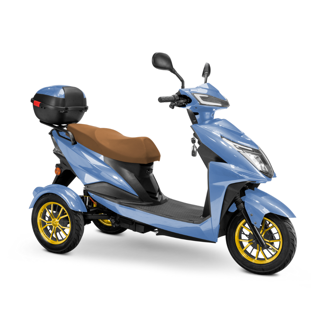 The Bespoke Regal Recreational 3-Wheel Scooter, in light blue with gold rims, a brown seat, black footrest, rear cargo box, visible ignition key, and a 600-watt motor is displayed against a white background.