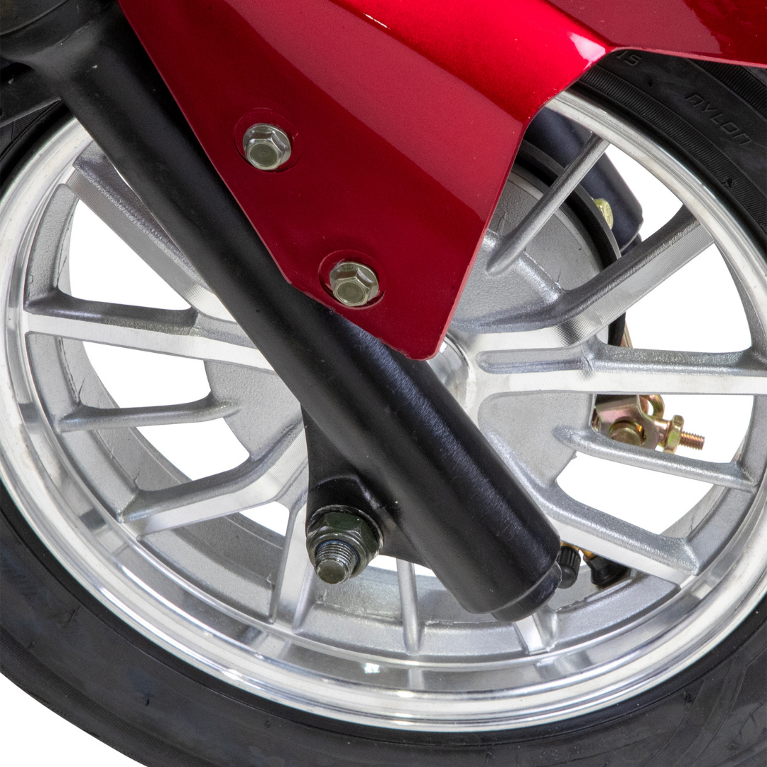 Close-up of the Bespoke Regal Recreational 3-Wheel Scooter’s front wheel with a silver alloy rim, black tire, and red/black suspension—featuring a high-performance 600W motor for superior riding experience.