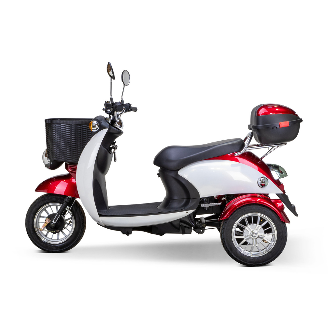 The Bespoke Supreme Euro-Style Recreational 3-Wheel Scooter with Electric Brake Assist has a 600-watt motor, black front basket, red and black storage box, and comes in red and white. Shown side view against a white background.
