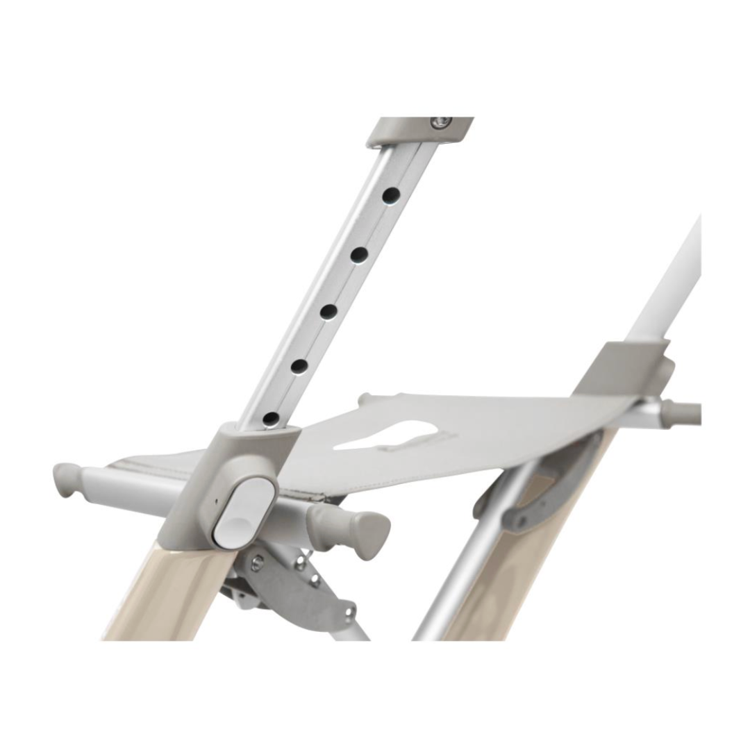 Close-up of an adjustable gray metal bracket with multiple holes, attached to a light beige support frame. The ByACRE Ultralight Carbon Fiber Rollator, weighing only 10.6 lbs, features a connecting mechanism and hinges as part of its foldable structure for mobility equipment.