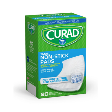 A blue and green box of Medline CURAD Sterile Nonstick Pads, 20 count. The packaging features “Non-Stick Layer for Ouchless Removal,” “For Protection and Absorption,” and an image of a sterile nonstick pad on the front.