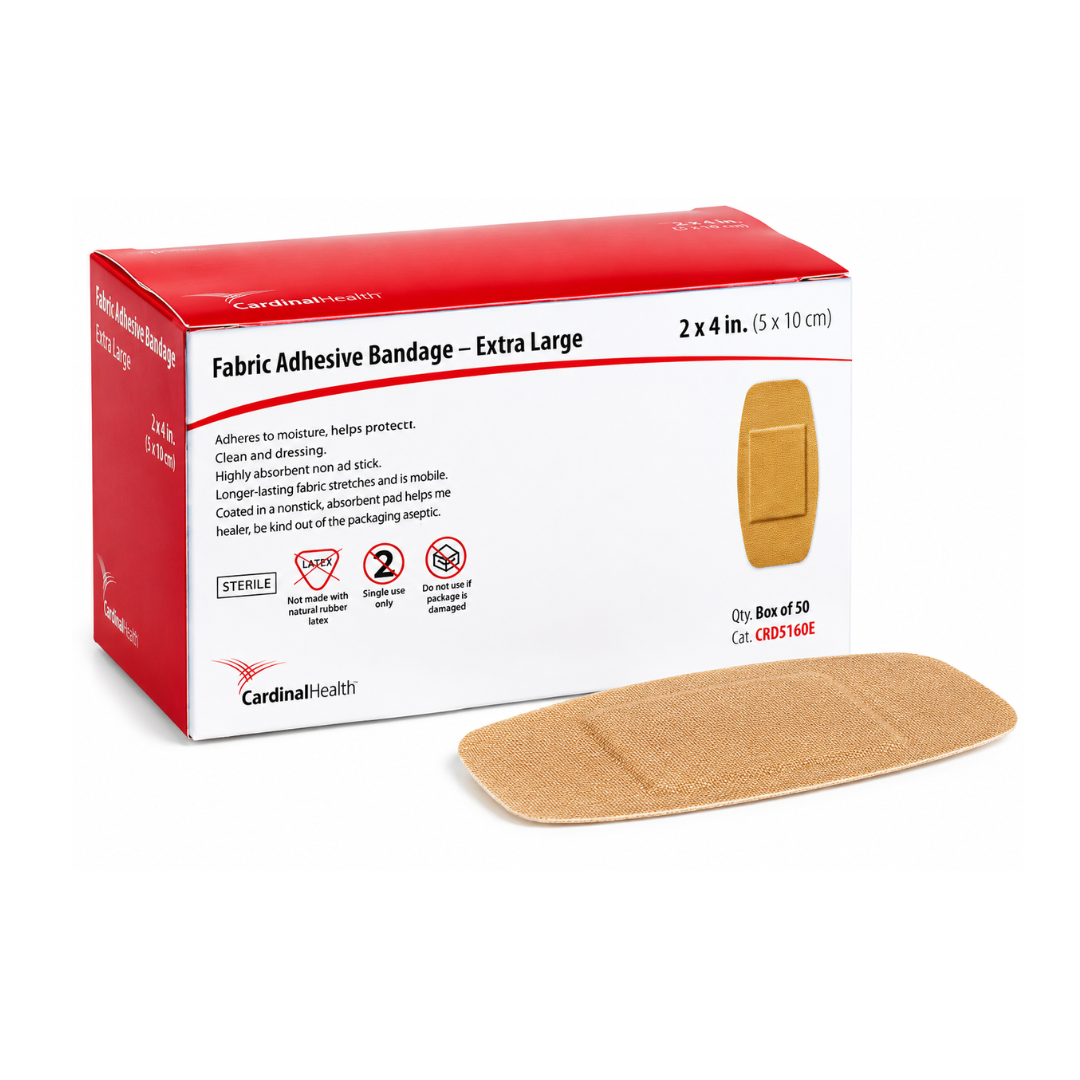 A red and white Cardinal Health Curity™ Fabric Adhesive Bandages box labeled "Extra Large" displays a 2” x 4” tan bandage in front, with the Cardinal Health logo emphasizing these fabric adhesive bandages.