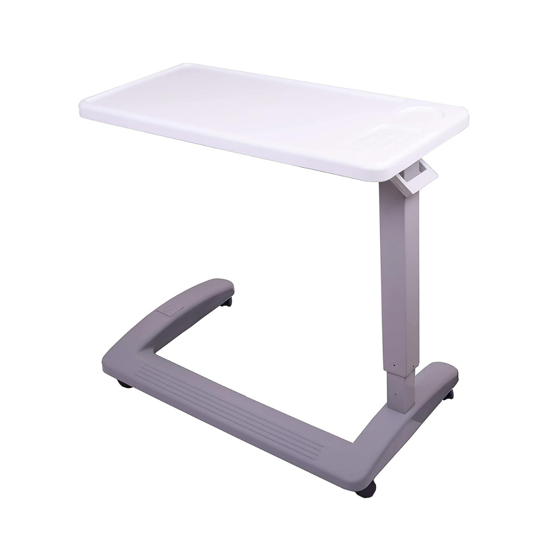 The Carex Height Adjustable Rolling Overbed Table with XL Surface features a white rectangular top and gray wheeled base, ideal for hospitals or home use as an overbed table for patients resting in bed.