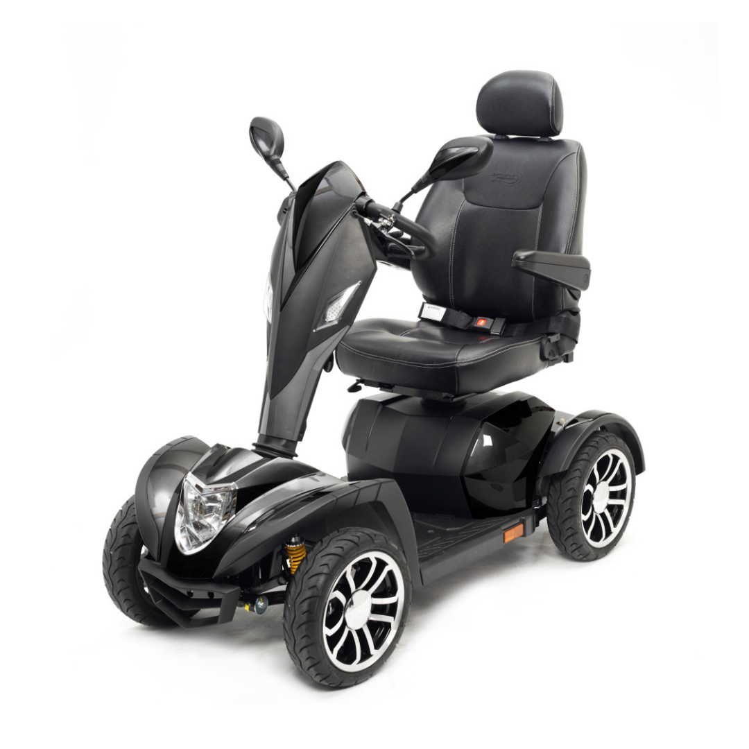 The Drive Cobra GT4 Heavy Duty Bariatric Mobility Scooter in black offers four wheels, a padded seat, armrests, handlebars, mirrors, and large tires—ideal for comfortable and accessible outdoor personal transportation.