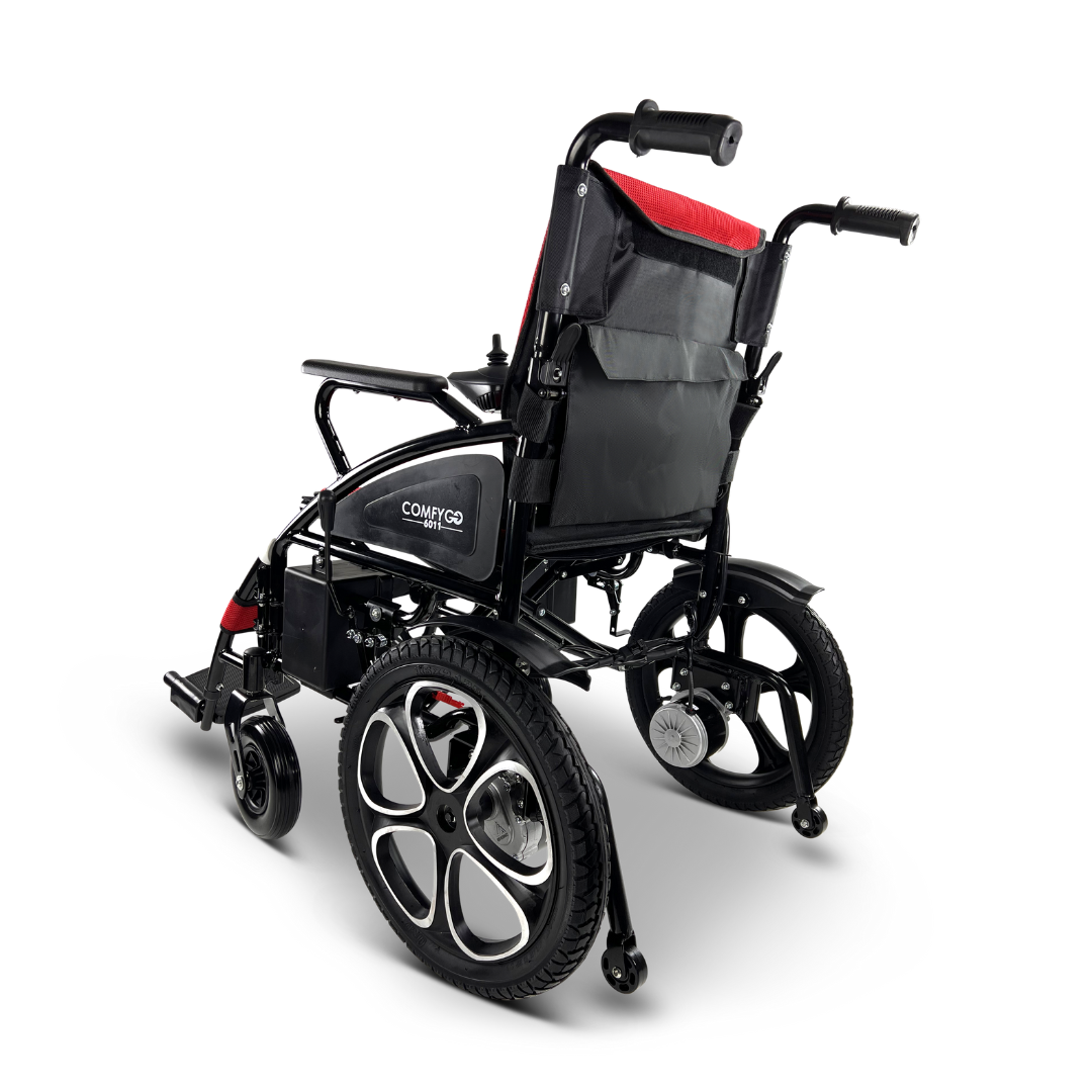 The ComfyGO 6011 Folding Electric Wheelchair is a lightweight, portable chair in black and red with large rear wheels, small front casters, and a comfy black seatback. It features a backrest storage pouch and adjustable armrests/footrests for enhanced mobility and comfort.