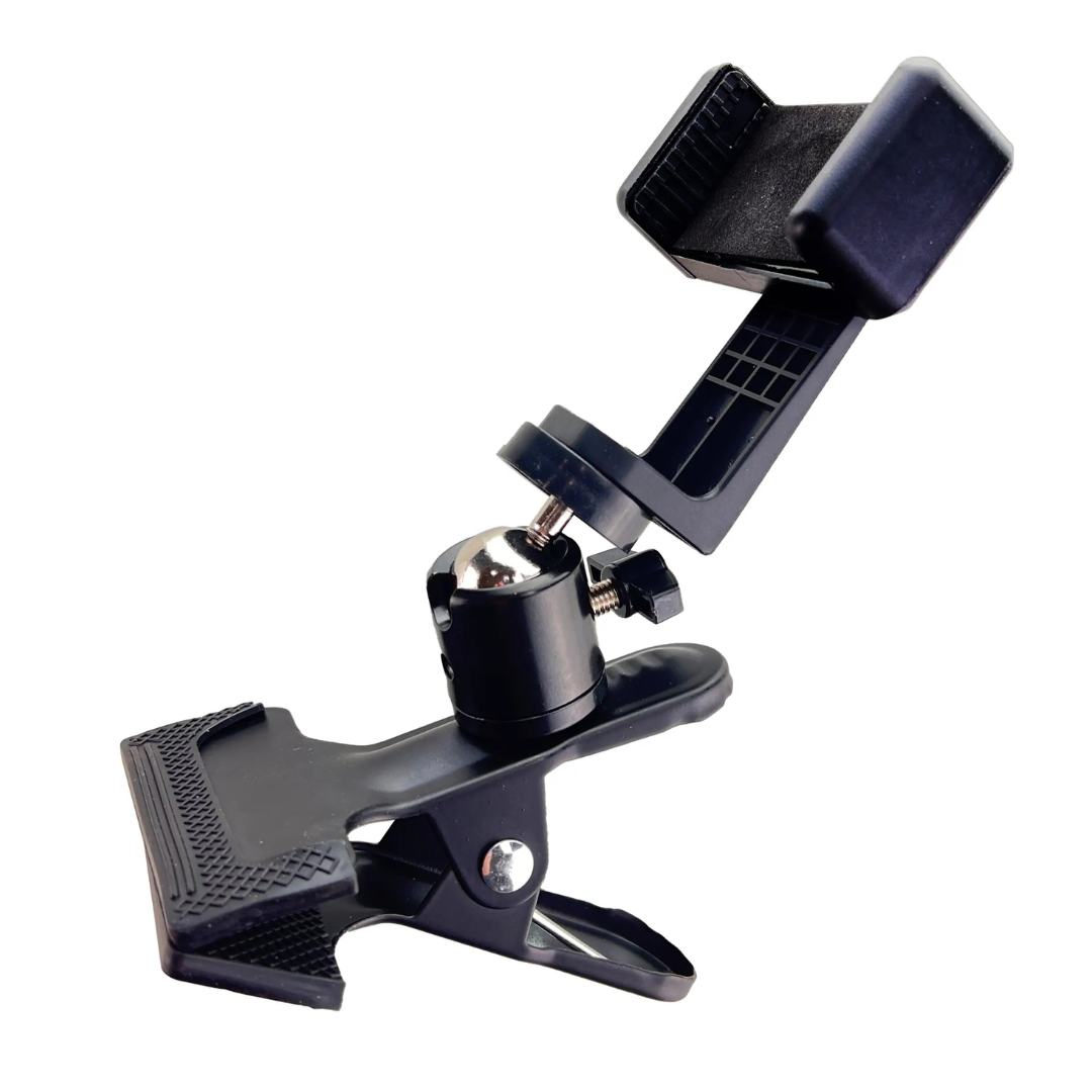 The ComfyGO Universal Phone Holder is a black clamp phone mount with an adjustable arm and rotating ball joint. Its perfect for electric wheelchairs and ideal for holding phones in various positions, featuring textured grips for enhanced stability.