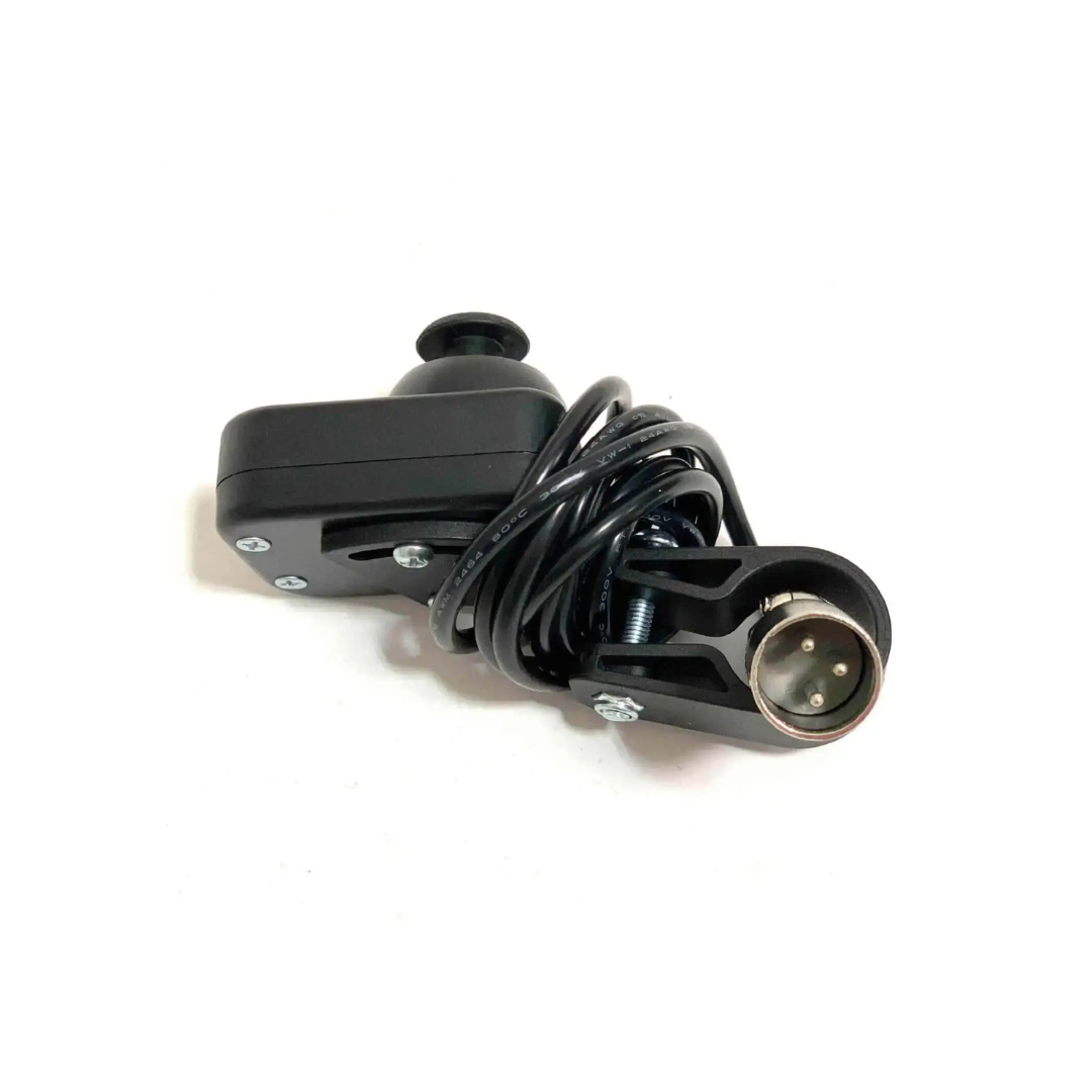 The ComfyGO Caregiver Controller for Electric Wheelchairs, a black electronic device with a coiled cable and metal connector, is displayed on a white background.