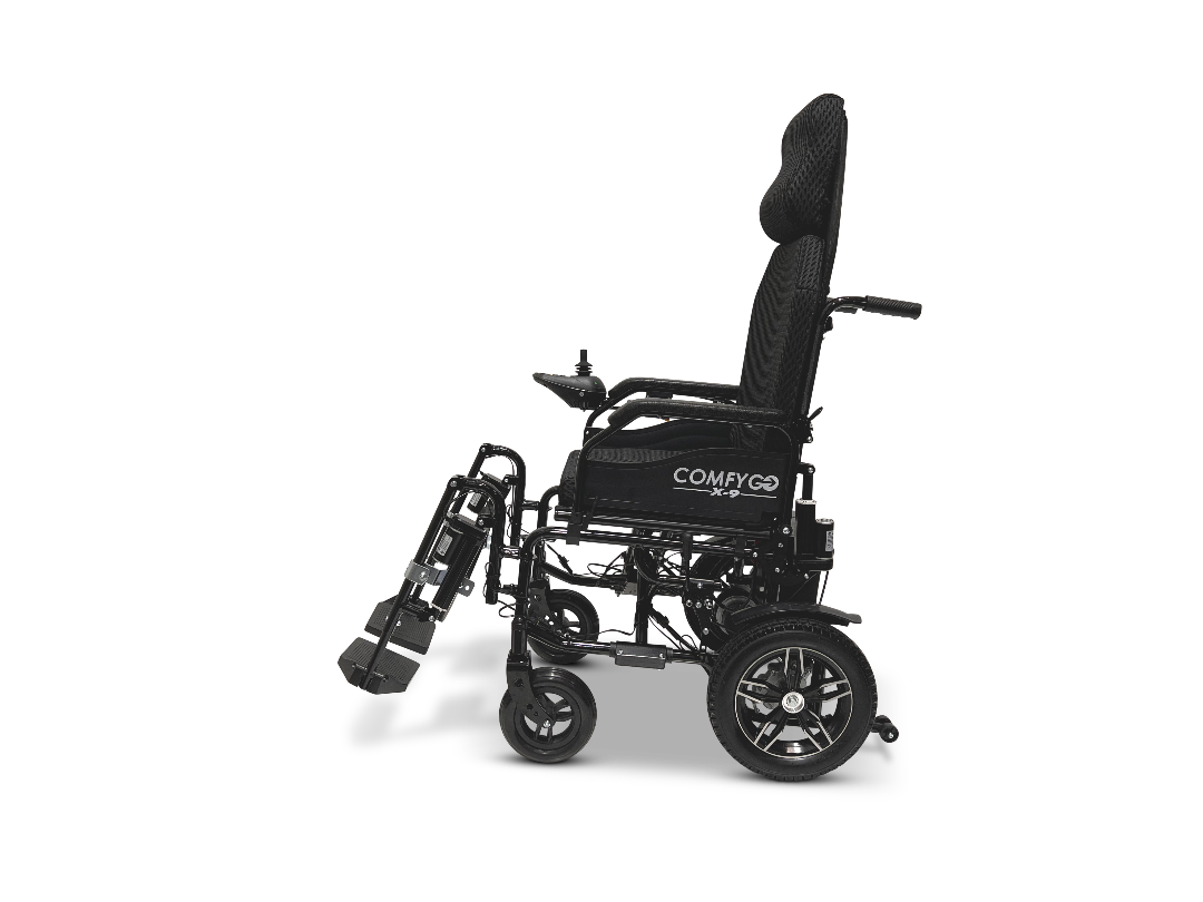 The ComfyGo X-9 Remote Controlled Powerchair in black offers enhanced comfort and mobility with its automatic reclining feature, raised seat, and angled footrests.
