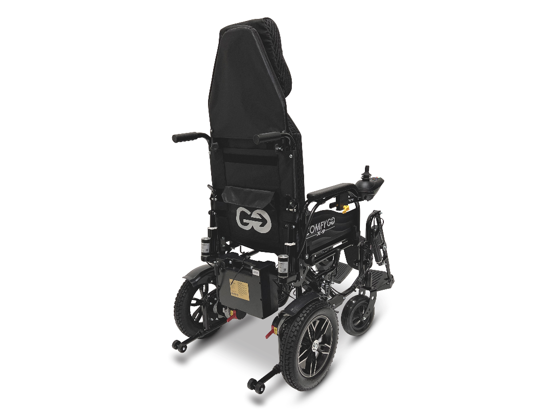 The ComfyGo X-9 Remote Controlled Powerchair in black features large wheels, a cushioned backrest, a right armrest joystick, and metallic footrests for enhanced mobility and comfort.