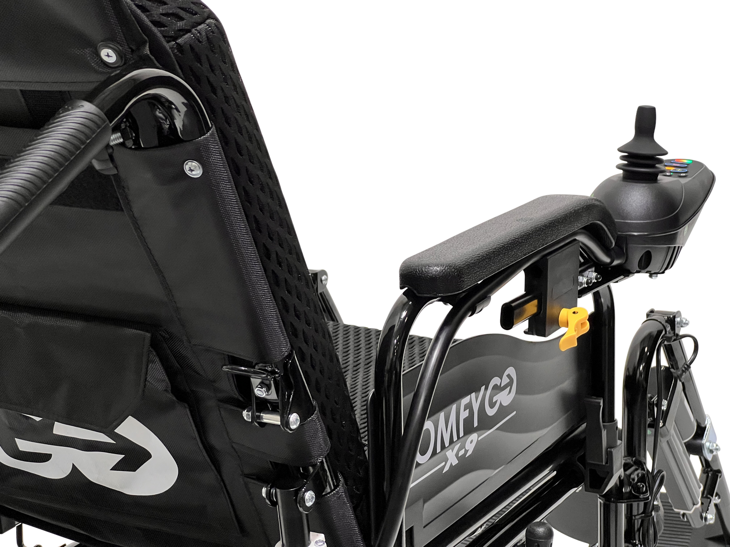 Close-up of the ComfyGo X-9 Remote Controlled Powerchair featuring a joystick on the right armrest, a mesh fabric backrest with a pocket, and sleek white text on the frame. Part of the seat support is visible, highlighting this sophisticated mobility solution.