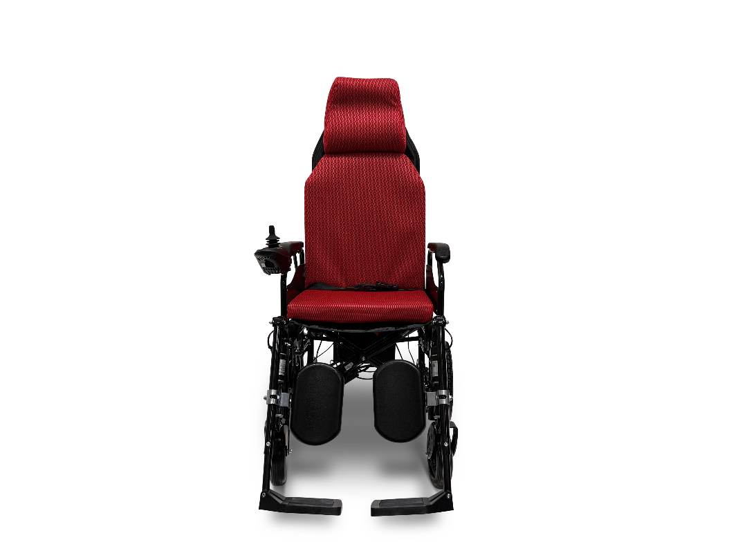The ComfyGo X-9 Pwerchair features a red design with a high backrest, cushioned seat, and joystick controller on the armrest. Automatic reclining provides comfort along with footrests for an ideal mobility solution set against a solid black background.