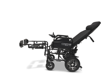 The side view of the black ComfyGo X-9 remote-controlled powerchair showcases ultimate maneuverability with adjustable seat and backrest, footrests, and rear/front wheels. The automatic reclining seat offers maximum comfort.