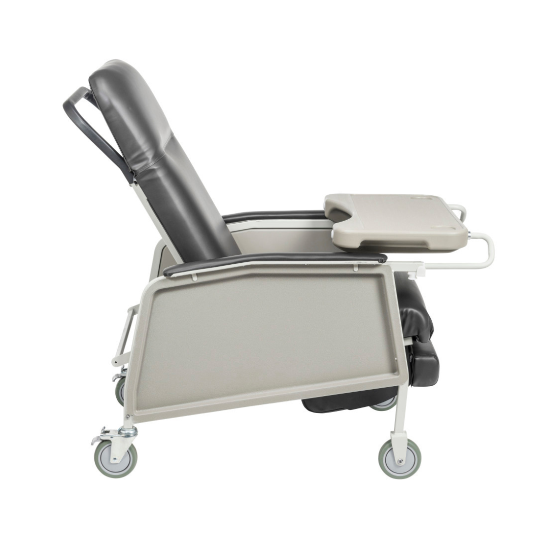 The Drive 3-Position Geri-Chair Recliner with Wheels, shown in side profile, features a padded black seat, adjustable backrest, attached tray table, and four caster wheels for easy mobility.