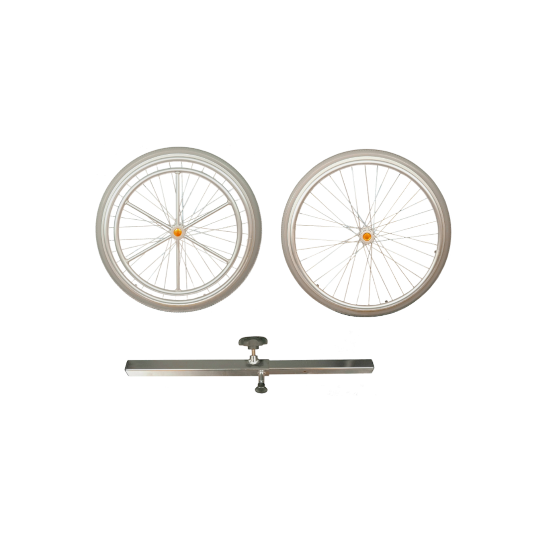 Two bicycle wheels with silver spokes and orange reflectors sit side by side above a metal bar with a center adjustment knob, showcasing the Drive Medical One-Arm Drive for Wheelchairs against a white background.