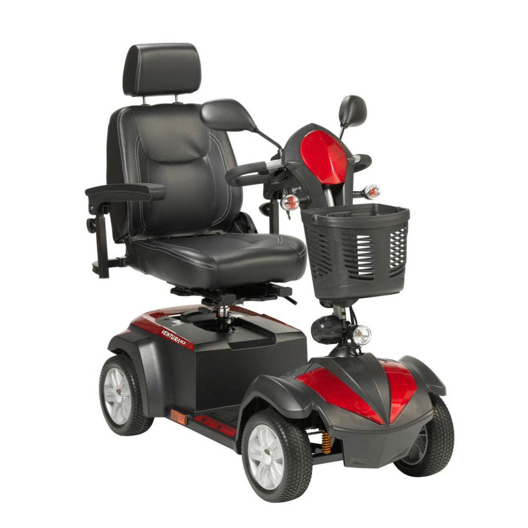 The Drive Ventura 4-Wheel HD Bariatric Scooter features a black cushioned seat with armrests, headrest, a striking red and black body, handlebar controls, and a convenient front basket.