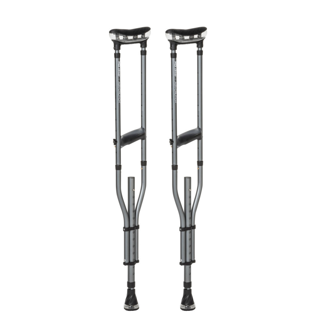 Drive Air-Crutches with Airgonomic™ Underarm Cushions, adjustable hand grips, and black rubber tips stand upright against a white background.